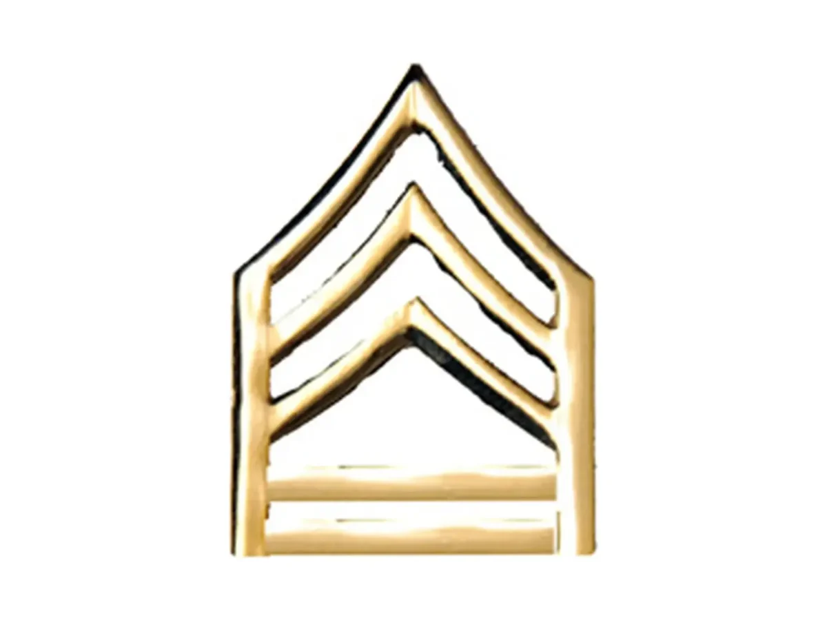 Insignia de metal Primera Clase M.D.G.